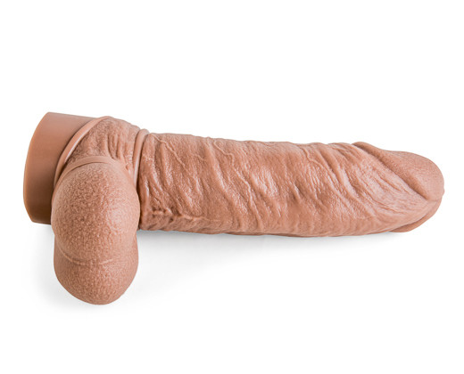 An oversized rubber dildo featuring a spacious opening, designed to enhance pleasure and provide a thrilling experience.