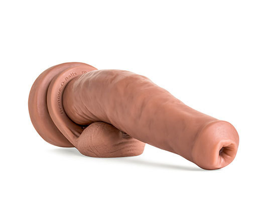 unsircumsized tall realistic mold of a penis sitting on detachable balls sideview 