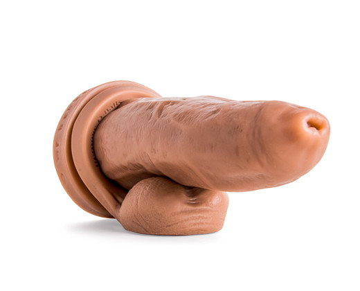 A close up of a dildo that is uncircumsized