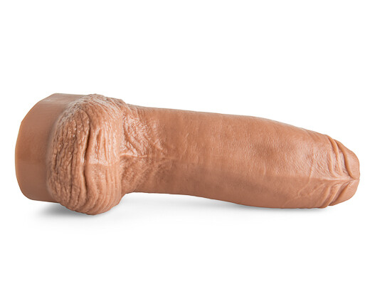 A big, brown rubber cock on a white background. Perfect for a fun and playful time.