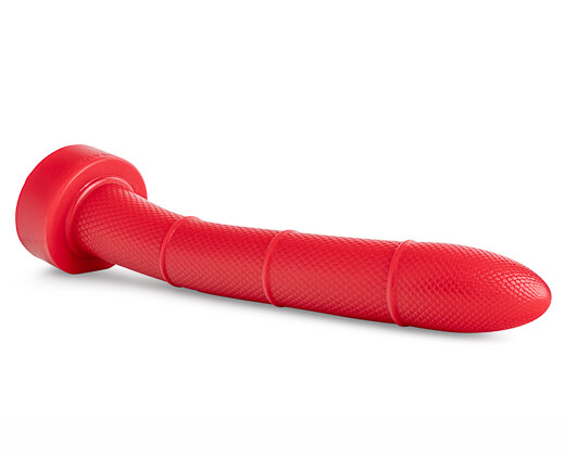 Vibrant red dildo on plain white backdrop