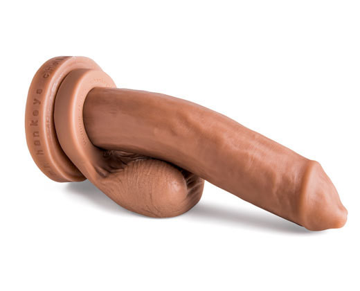 A realistic brown dildo with a small hole for added pleasure.